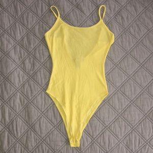 Bright yellow body suit!